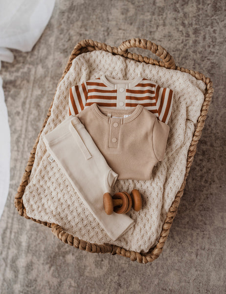 Biscuit striped long sleeve bodysuit